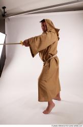 JOEL_ADAMSON STANDING POSE WITH SWORD